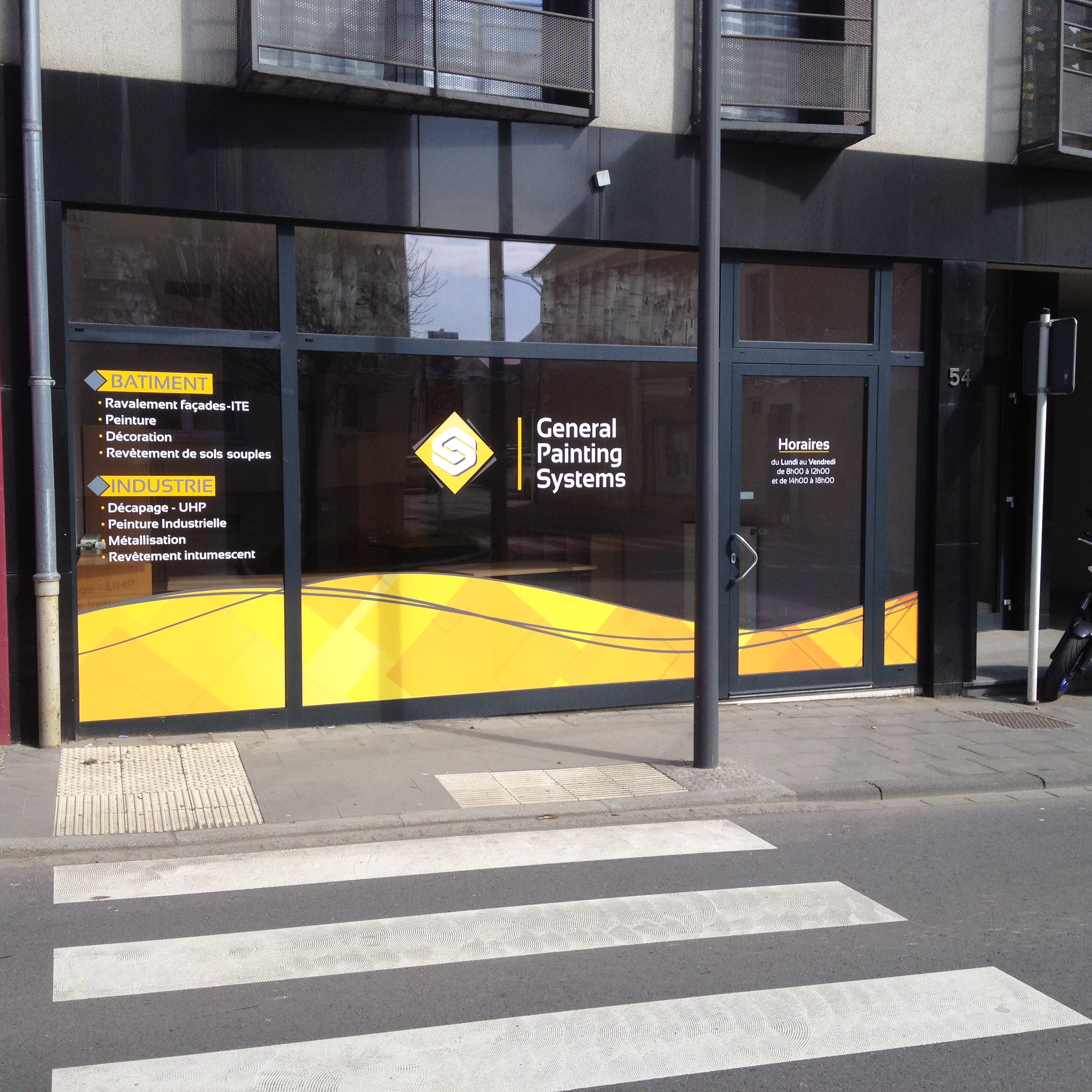Vitrophanie et habillage de façade commerciale — réalisation Pub'XL